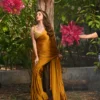 Mustard yellow laser georgette saree with embroidered blouse