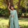 Aqua blue chinnon saree with hand embroidered blouse 1