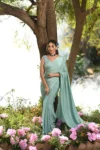 Aqua blue chinnon saree with hand embroidered blouse 2