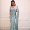 Blue chiffon saree with embroidered blouse 2