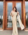 Tan gold laser georgette saree with oat golden blouse 1